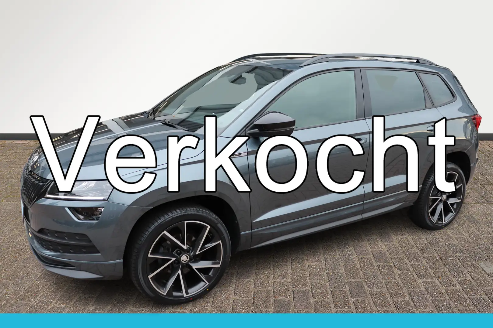 Skoda Karoq 1.5 TSI ACT Sportline Business, automaat, panorama Gris - 1