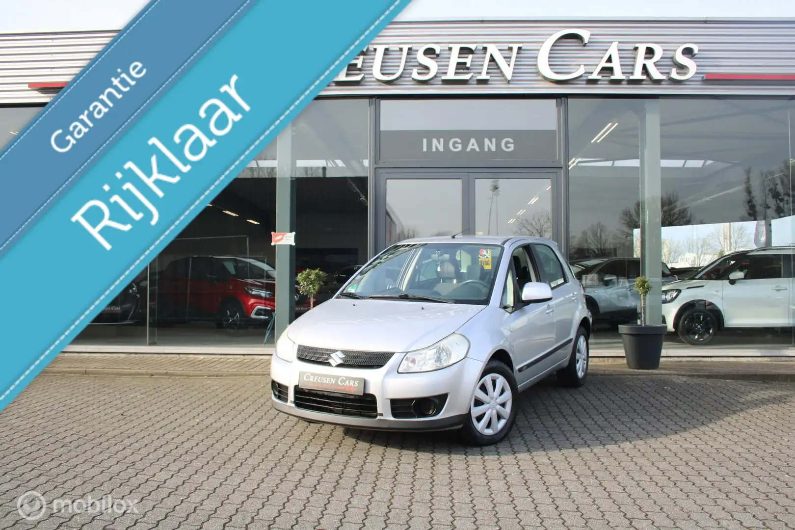 Suzuki SX4 1.6 Comfort/Trekhaak/Airco/Cv/Elec.ramen/ Grijs - 1