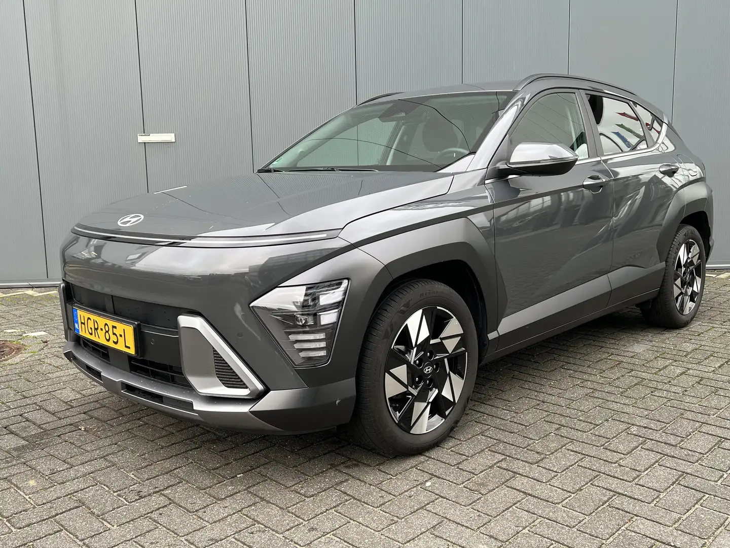 Hyundai KONA 1.6 GDI 141pk HEV Comfort Smart | Camera | Draadlo Grijs - 1