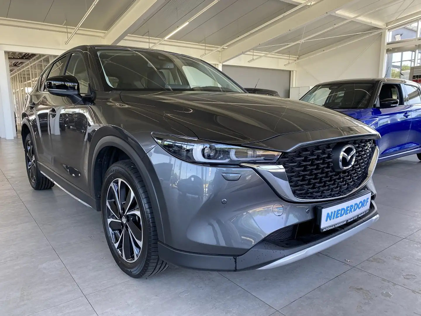 Mazda CX-5 2.0 Newground NAVI KAM 360* LED LEDER Grau - 1