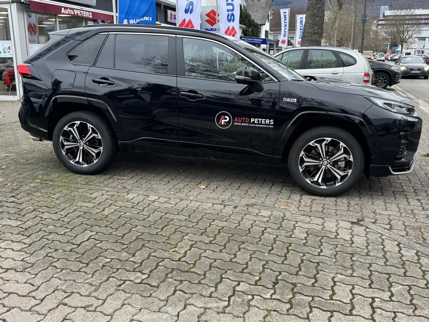 Suzuki Across Erleben Sie den Suzuki Across: Stil, Komfort und L Schwarz - 2