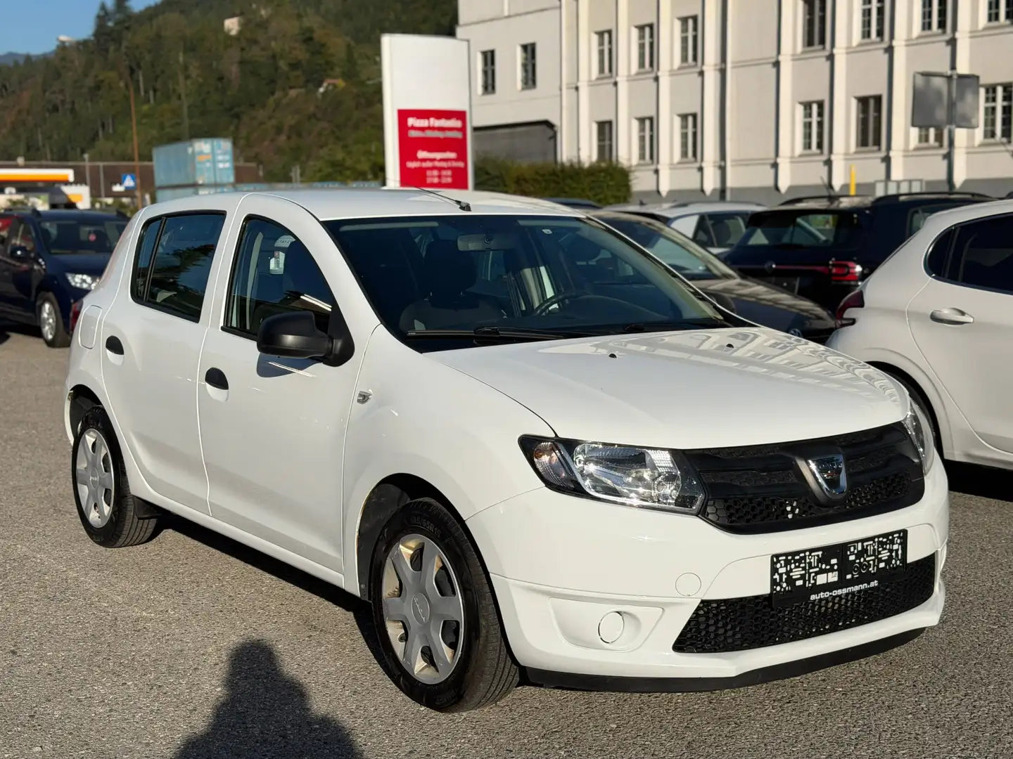 Dacia Sandero TCe Essentiel | TÜV NEU | Navi | Weiß - 1