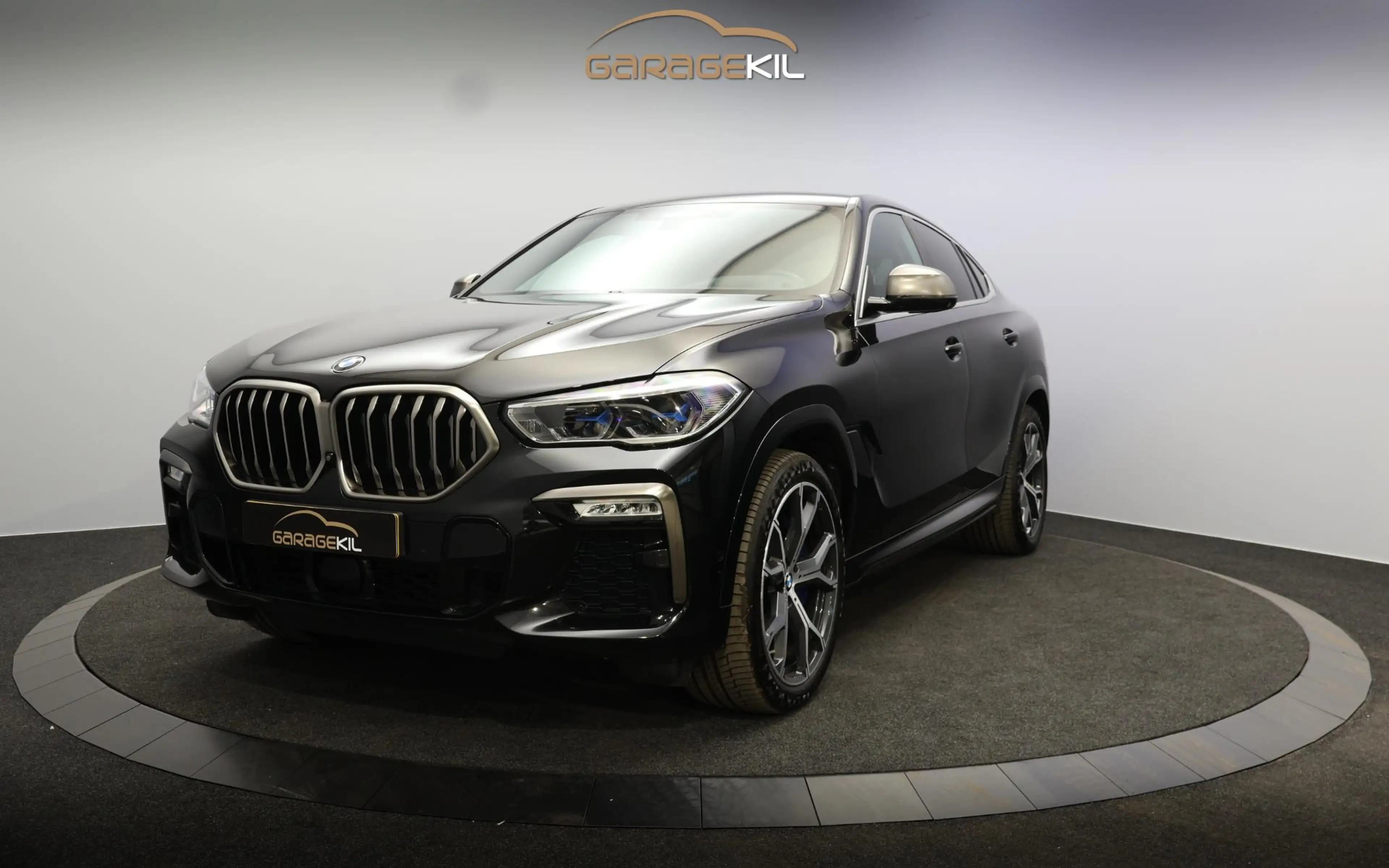 BMW X6 M50i High Executive Orig. NL / 360 Camera / Leder — photo 2