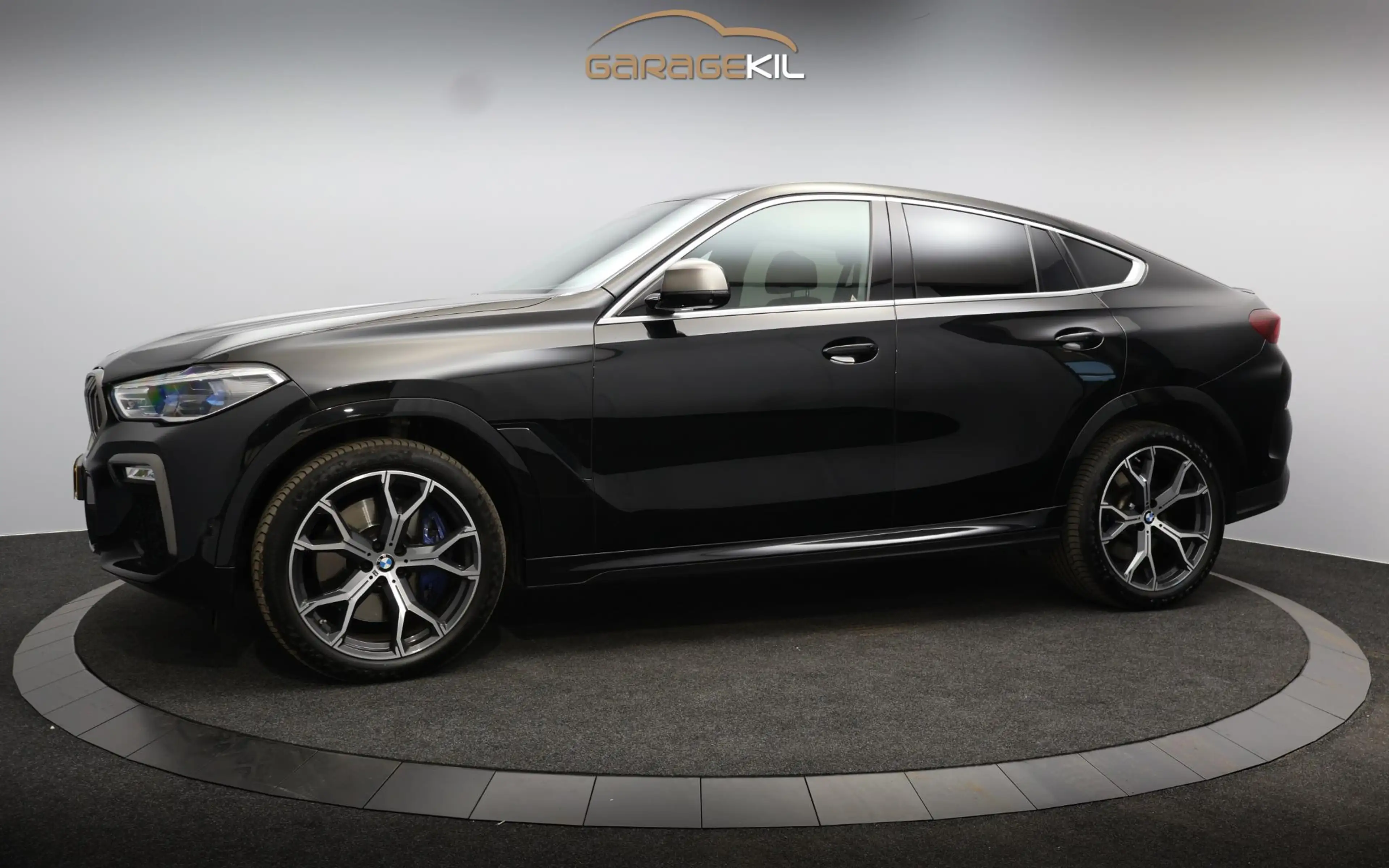 BMW X6 M50i High Executive Orig. NL / 360 Camera / Leder — photo 14