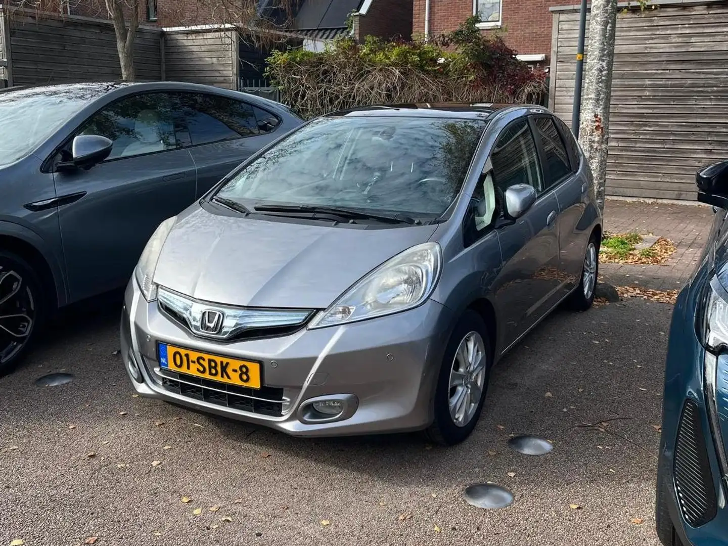 Honda Jazz 1.4 Hybrid Elegance Automatic - Panoramic roof Zilver - 1