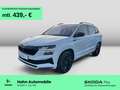 Skoda Karoq 1.5 TSI DSG Sportline AHK Navi Matrix CAM Weiß - thumbnail 1