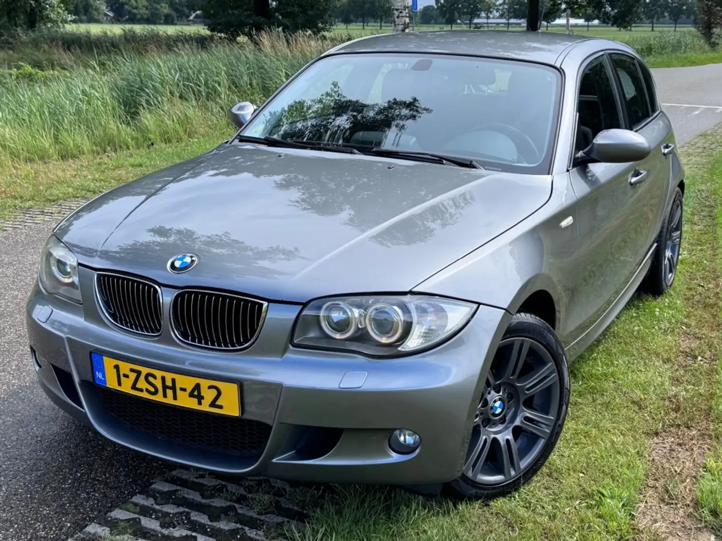 BMW 118D / MPAKKET / 17 INCH / NAVI / XENON Gris - 1