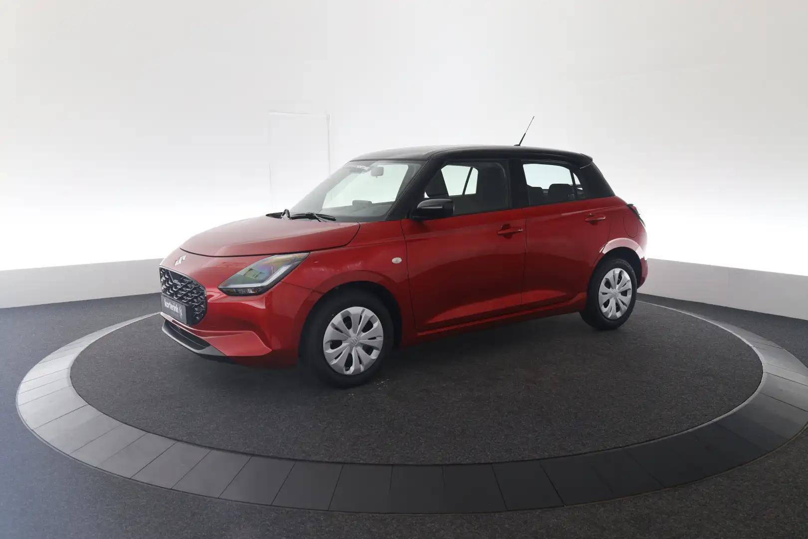 Suzuki Swift 1.2 Comfort Smart Hybrid | € 2.500,- korting | Pri Rood - 2