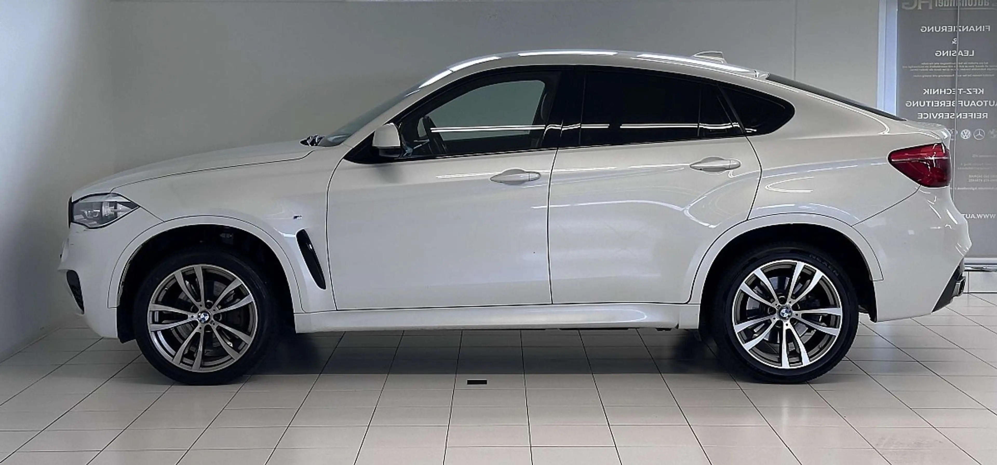 BMW X6 xDrive40d Sport Activity Coupé Österreich-Paket... — photo 8