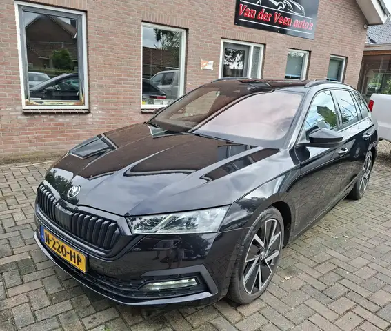 Skoda Octavia Combi 1.5 e-TSI Business Edition Plus. O.a. verwar