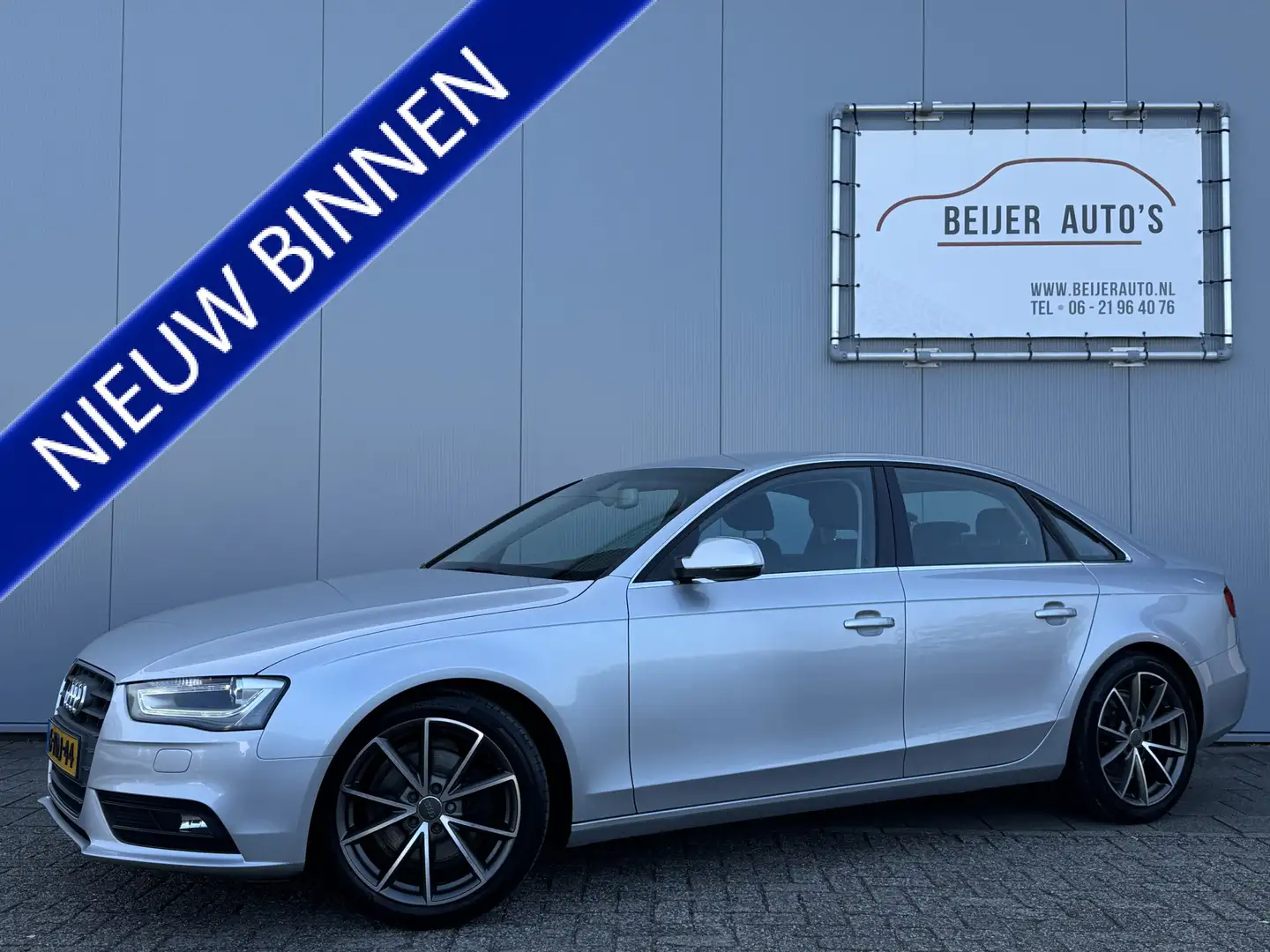Audi A4 Limousine 1.8 TFSIe Edition Navigatie/Trekhaak/18i Grijs - 1