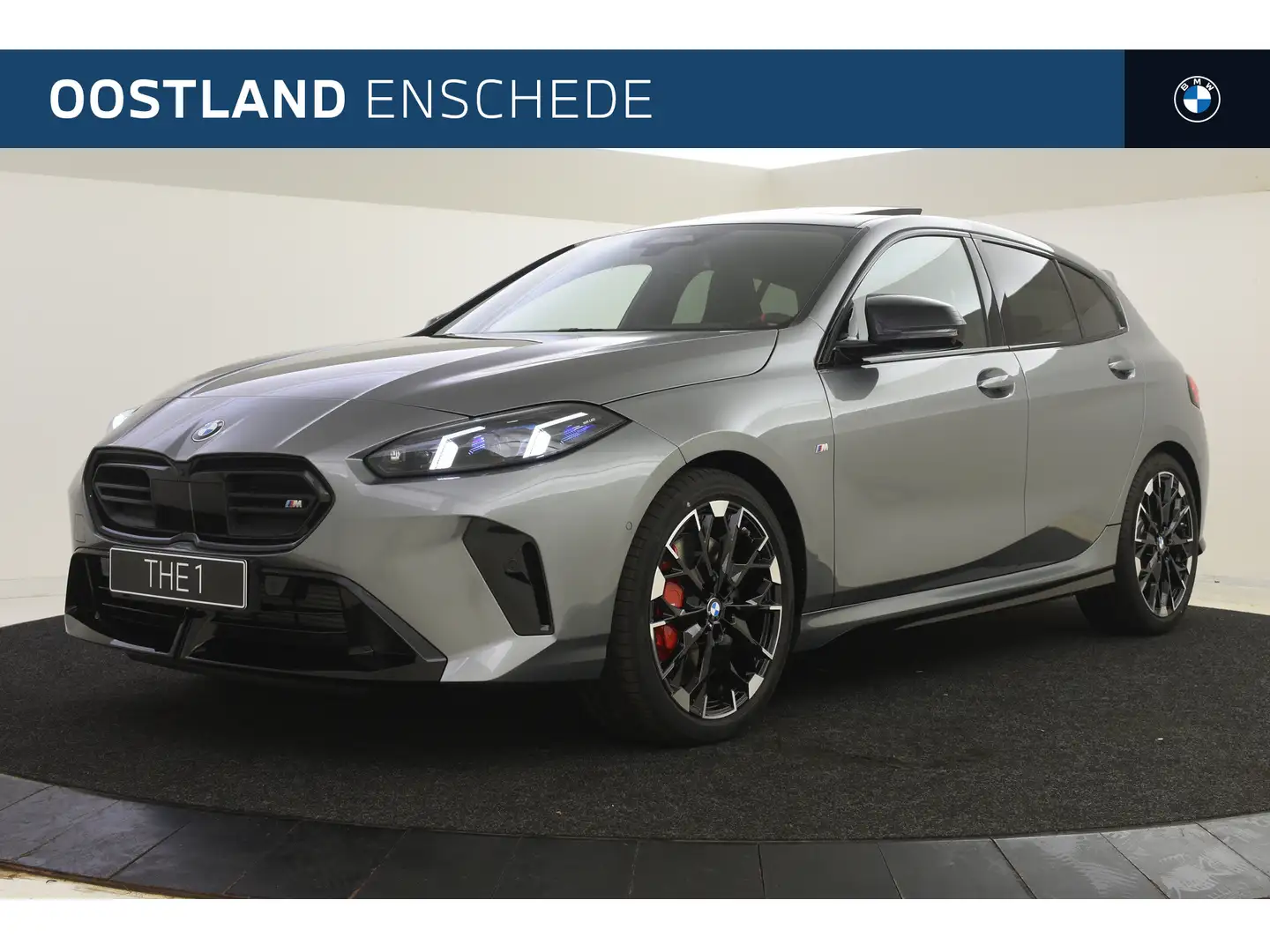 BMW 135 1 Serie M135i xDrive High Executive Automaat / Pan Grijs - 1