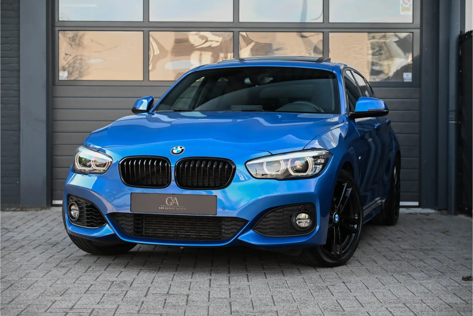 BMW 118 1-serie 118i Edition M Sport Shadow High Executive Blauw - 1