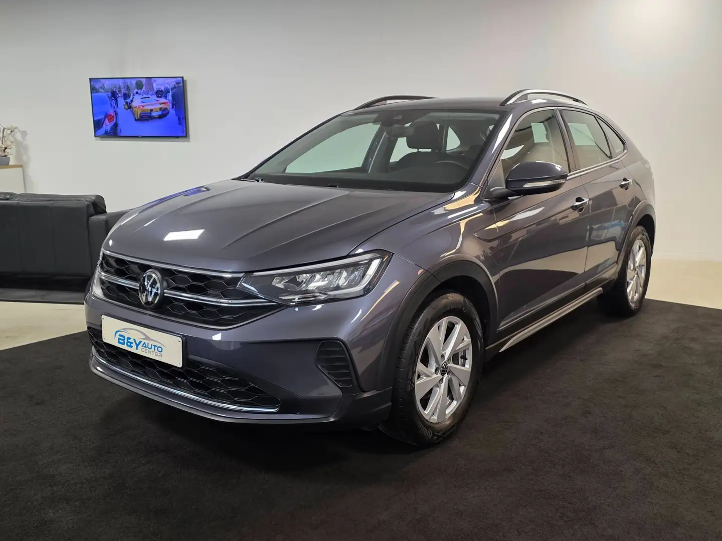 Volkswagen Taigo 1.0 TSI OPF Move - PDC - Camera -Apple Carplay Grijs - 1