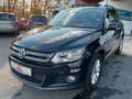 Volkswagen Tiguan 1.4 TSI DSG Navi Kamera Klima SHZ Pano Schwarz - thumbnail 1