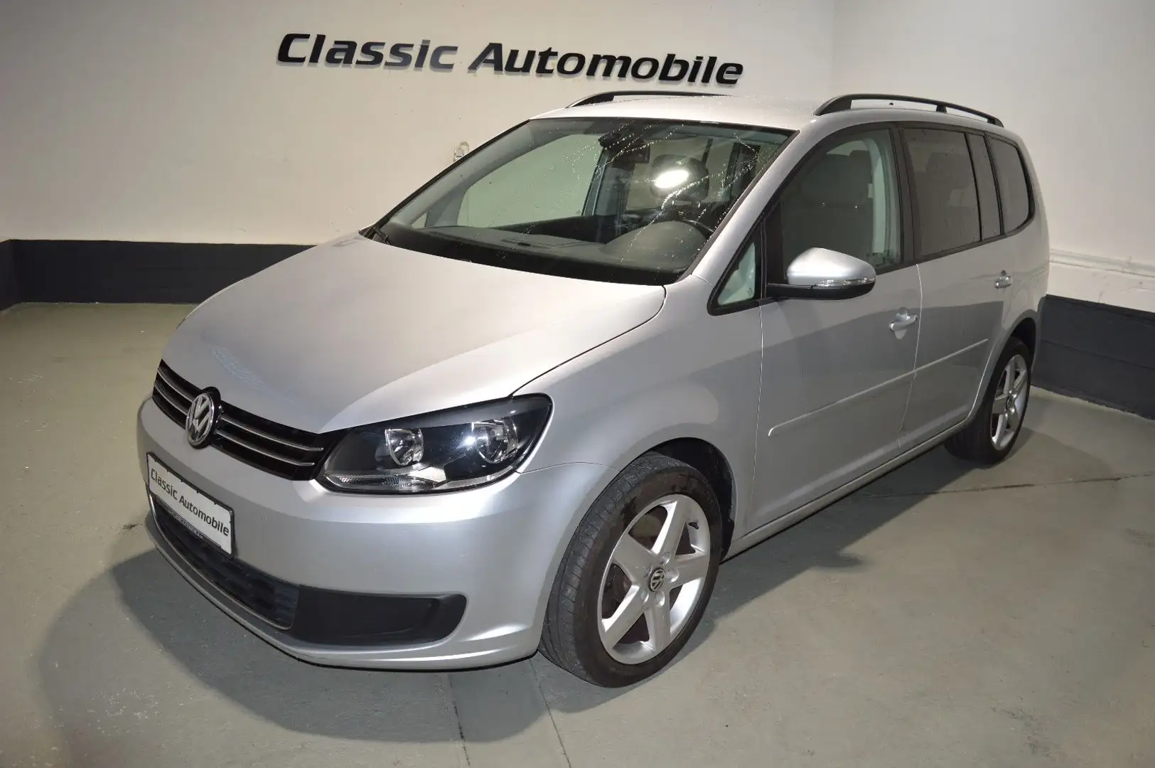 Volkswagen Touran Comfortline 1.4 TSI *7-Sitzer*Navi*PDC* Silber - 1