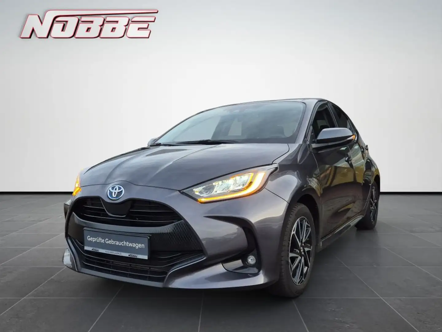 Toyota Yaris Hybrid 1.5 VVT-i Team D *Allwetter+Comfort* Grau - 1