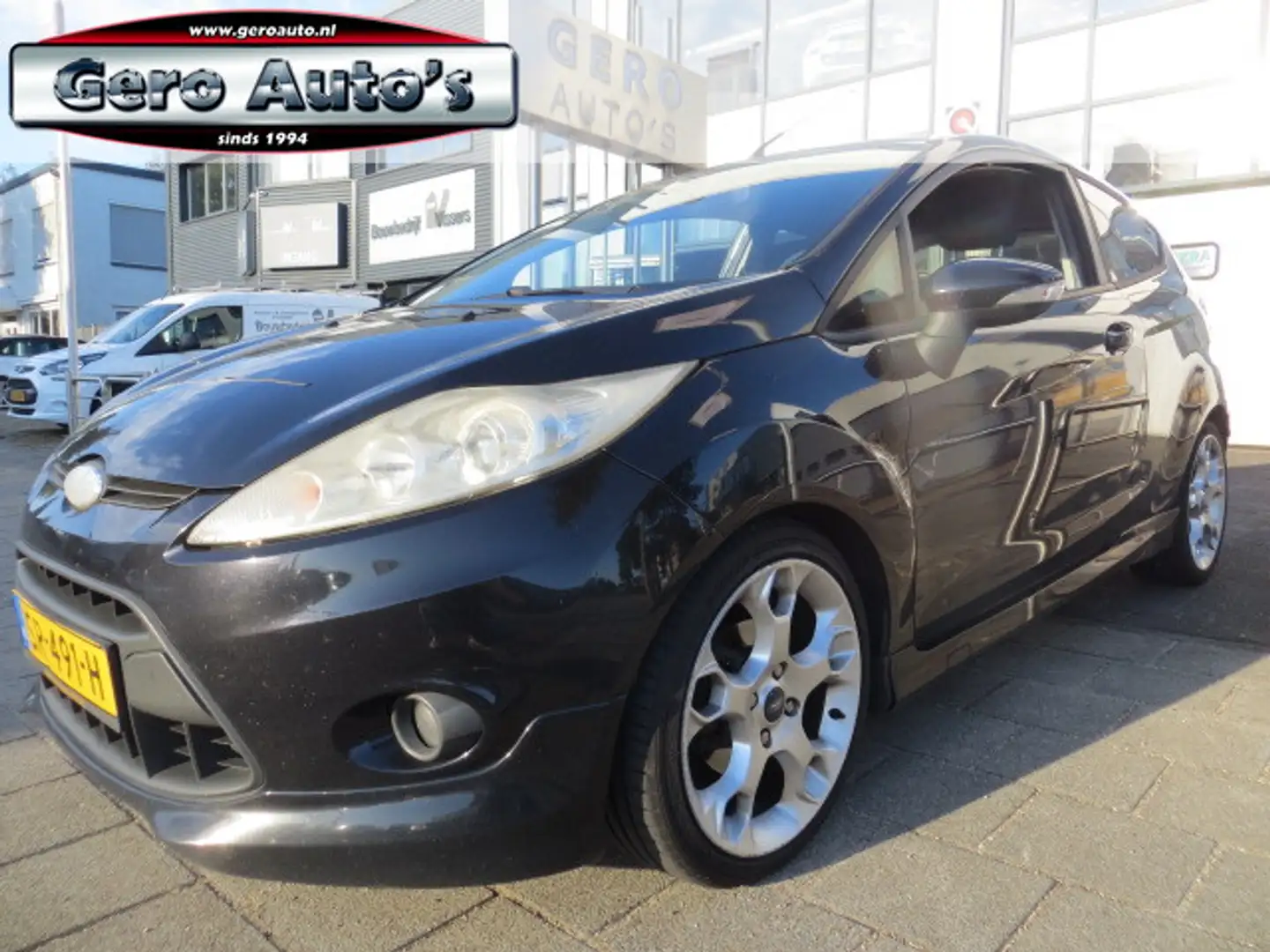 Ford Fiesta 1.6 Ghia sport spoilerpakket ,17 inch airco etc Schwarz - 1