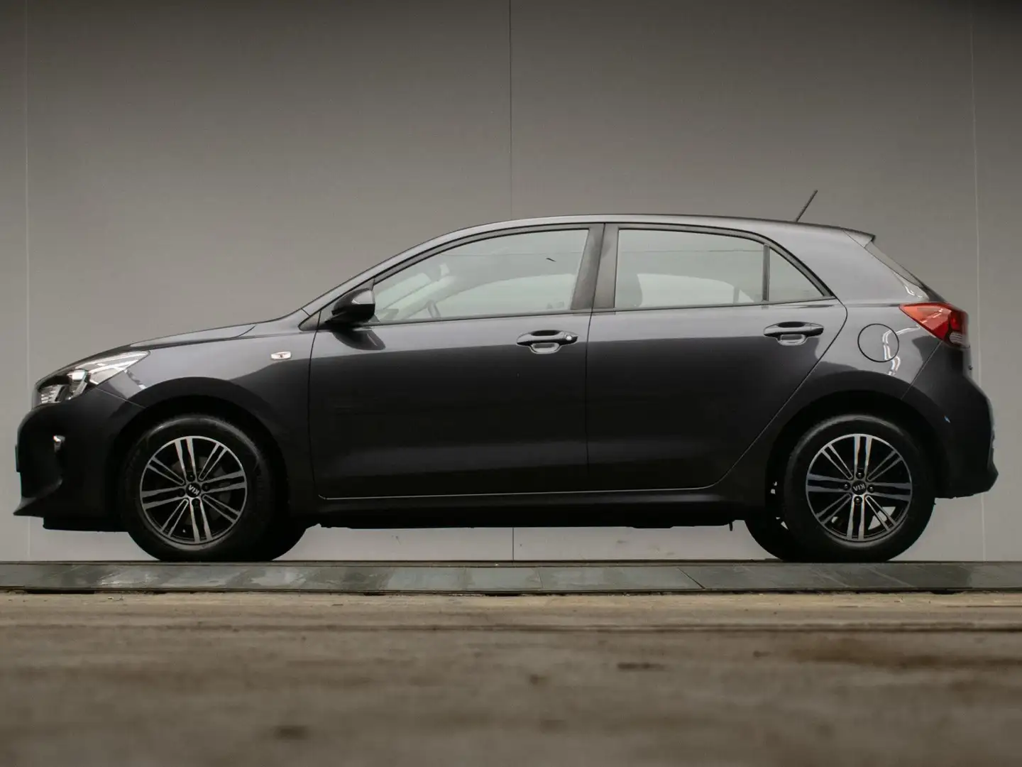 Kia Rio 1.0 TGDI ComfortPlusLine Navigator Sport (NAVI,CRU Grijs - 1