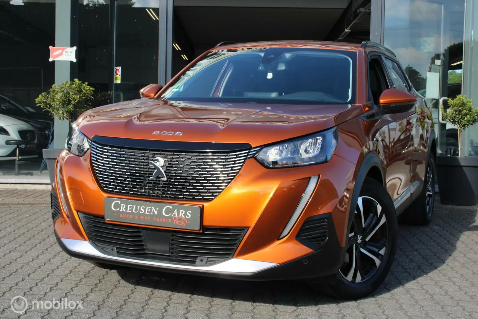 Peugeot 2008 1.2 PureTech Blue Lease Allure/Led/Navi/Cam/ Orange - 2