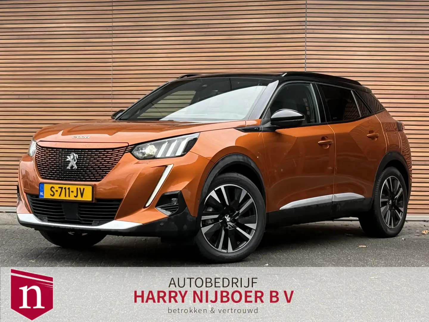 Peugeot e-2008 EV GT Pack 50 kWh Trekhaak / Clima / Camera / Navi Oranje - 1