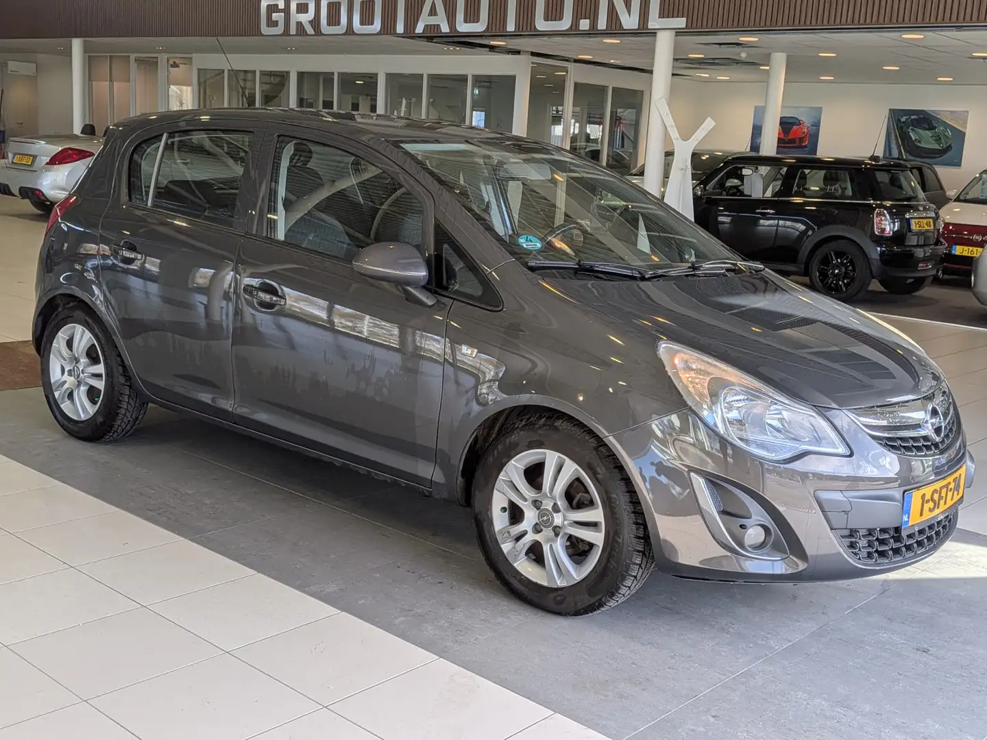 Opel Corsa 1.4-16V Design Edition Airco, Cruise Control, Stuu Grau - 1