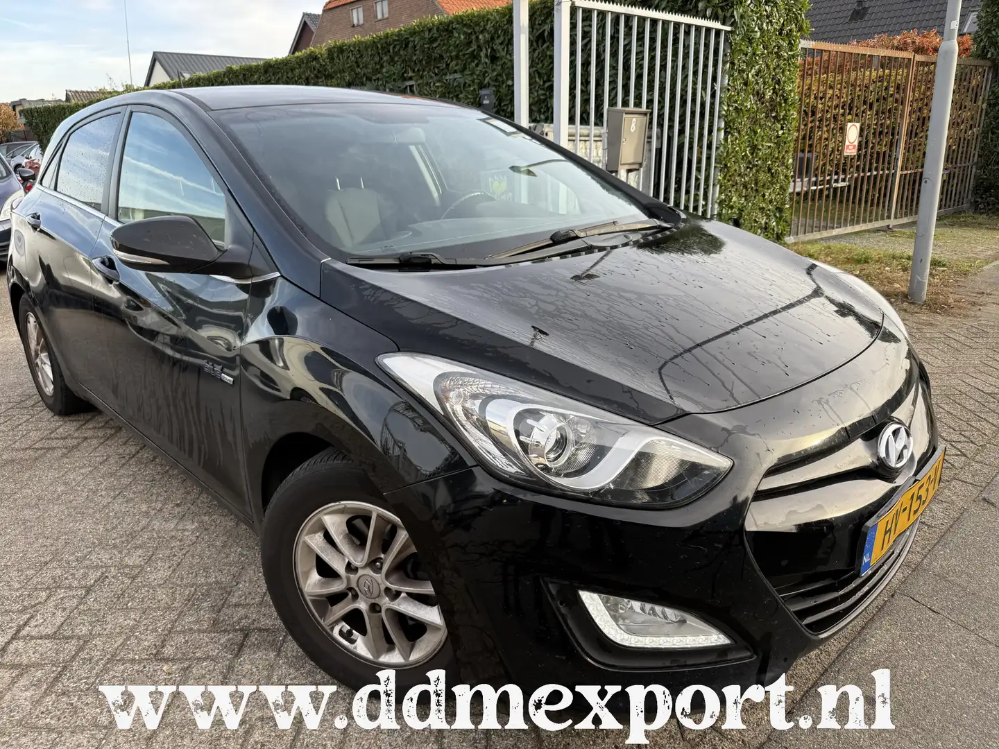 Hyundai i30 1.6 GDI i-Motion Plus CLIMA/NAVI Zwart - 1