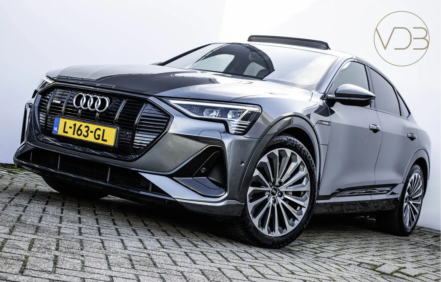 Audi e-tron Sportback 55 408pk SOH 93% LEER B&O PANO 21INCH Or Gris - 1