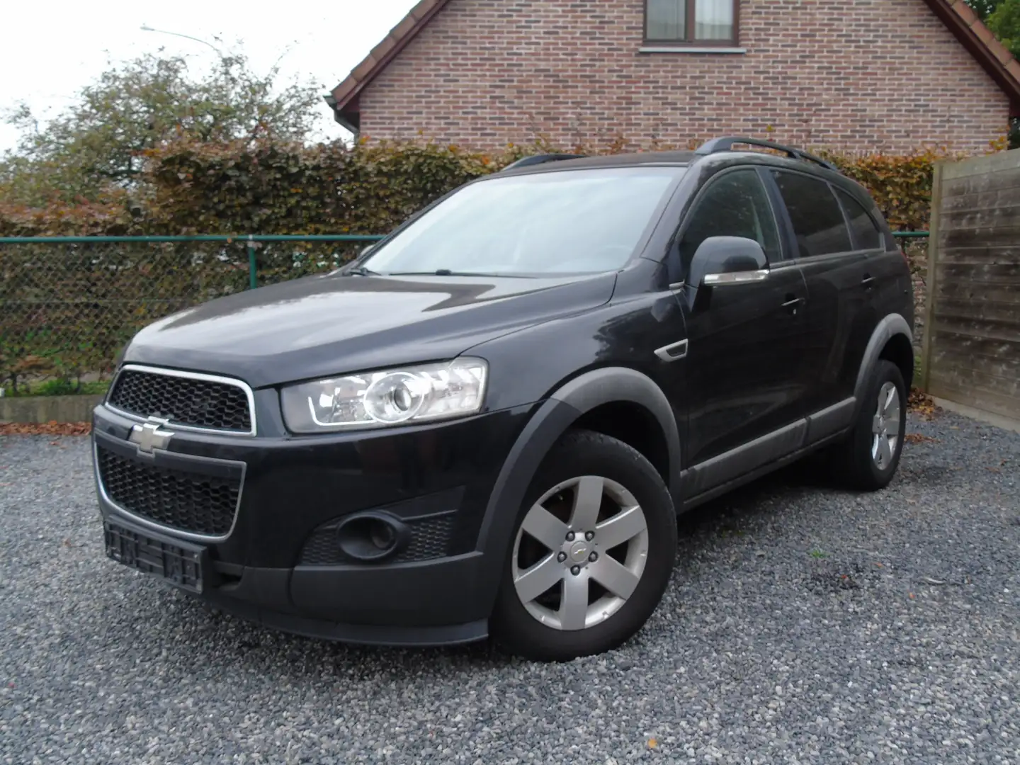 Chevrolet Captiva 2.2 TCDi FWD LS 5Plts *1e Eigen*Ohb*Navi *EURO 5 Zwart - 1