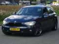 BMW 116 1-serie 116i EDE Business 5DRS NAP/LEER/NAVI/PDC/N Blauw - thumbnail 1