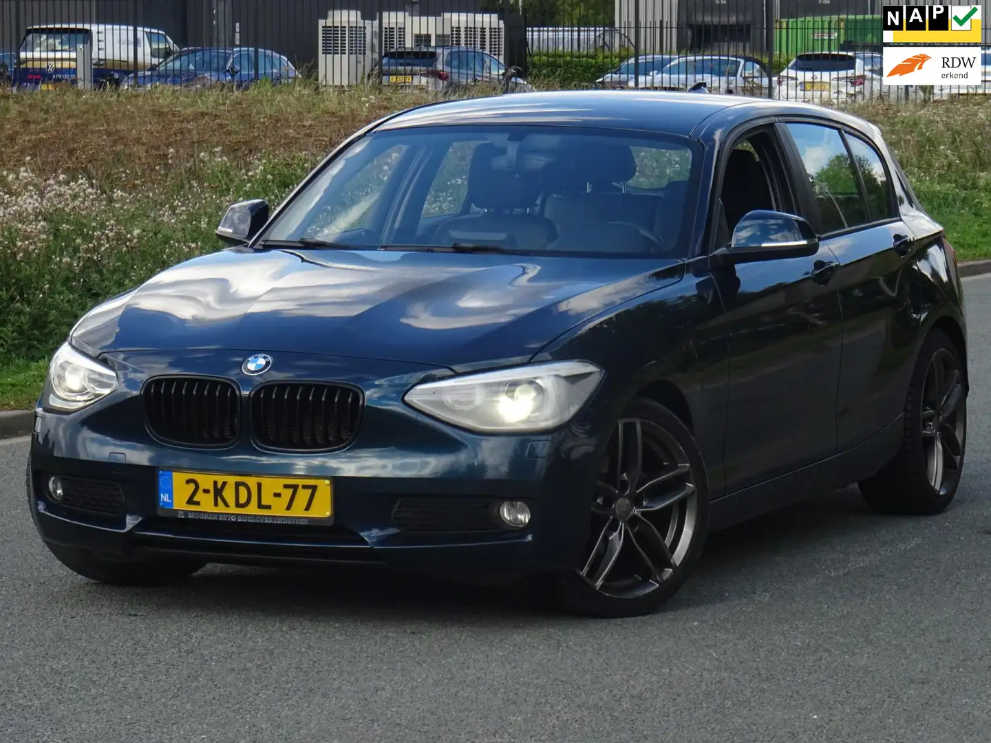 BMW 116 1-serie 116i EDE Business 5DRS NAP/LEER/NAVI/PDC/N Blauw - 1