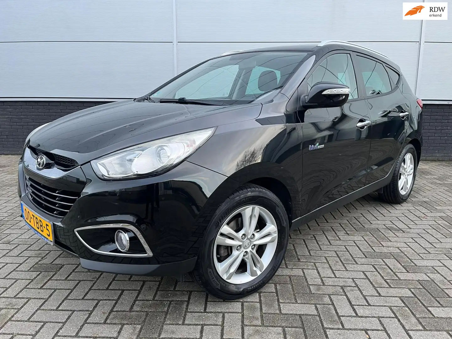 Hyundai iX35 1.6i GDI Style Clima - 6-vers. - half leder - trek Noir - 1