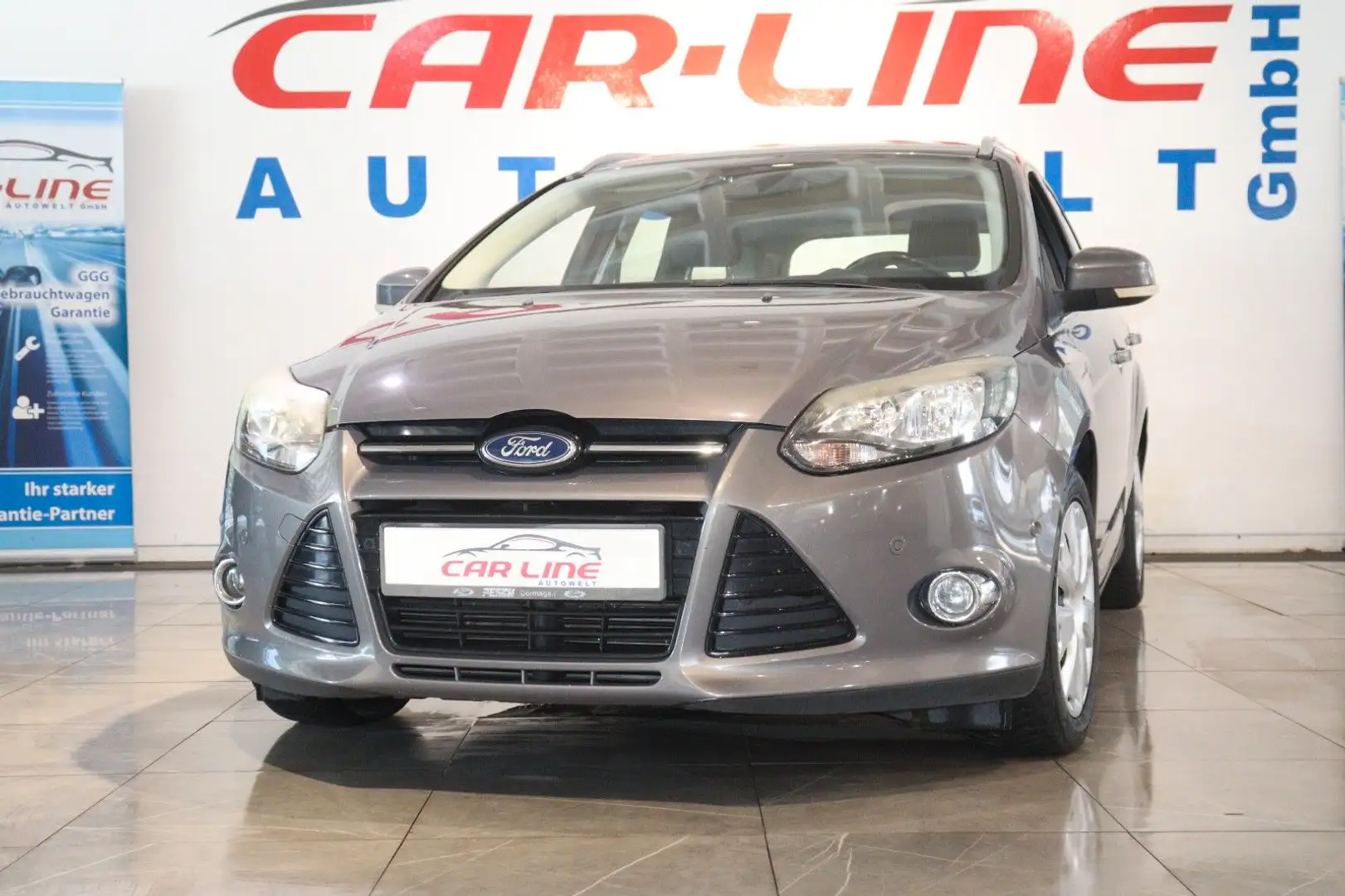 Ford Focus Turnier Titanium *1.Hand*Klima*Alu*PDC* Braun - 1