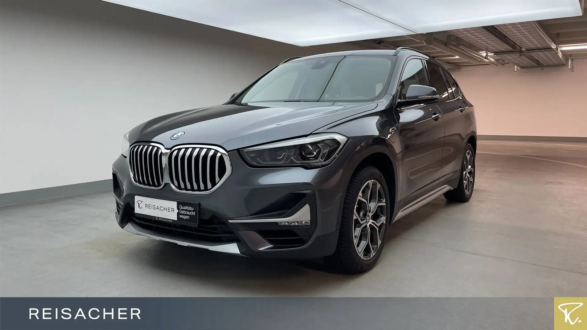 BMW X1 xDrive 25e A  X-Line,AHK,Navi,RFK,LM18" Grau - 1