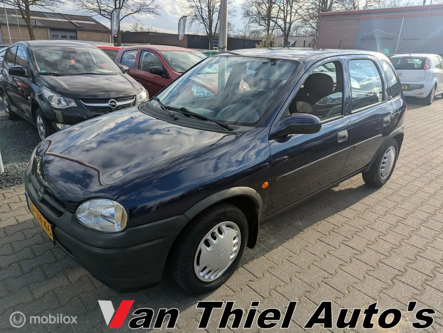 Opel Corsa 1.2i-16V Strada vol automaat stuurbekrachtiging Blau - 1