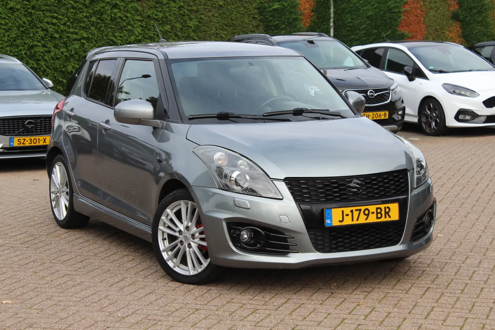Suzuki Swift 1.6 Sport / Sportstoelen / Xenon / Stoelverwarming Grijs - 1