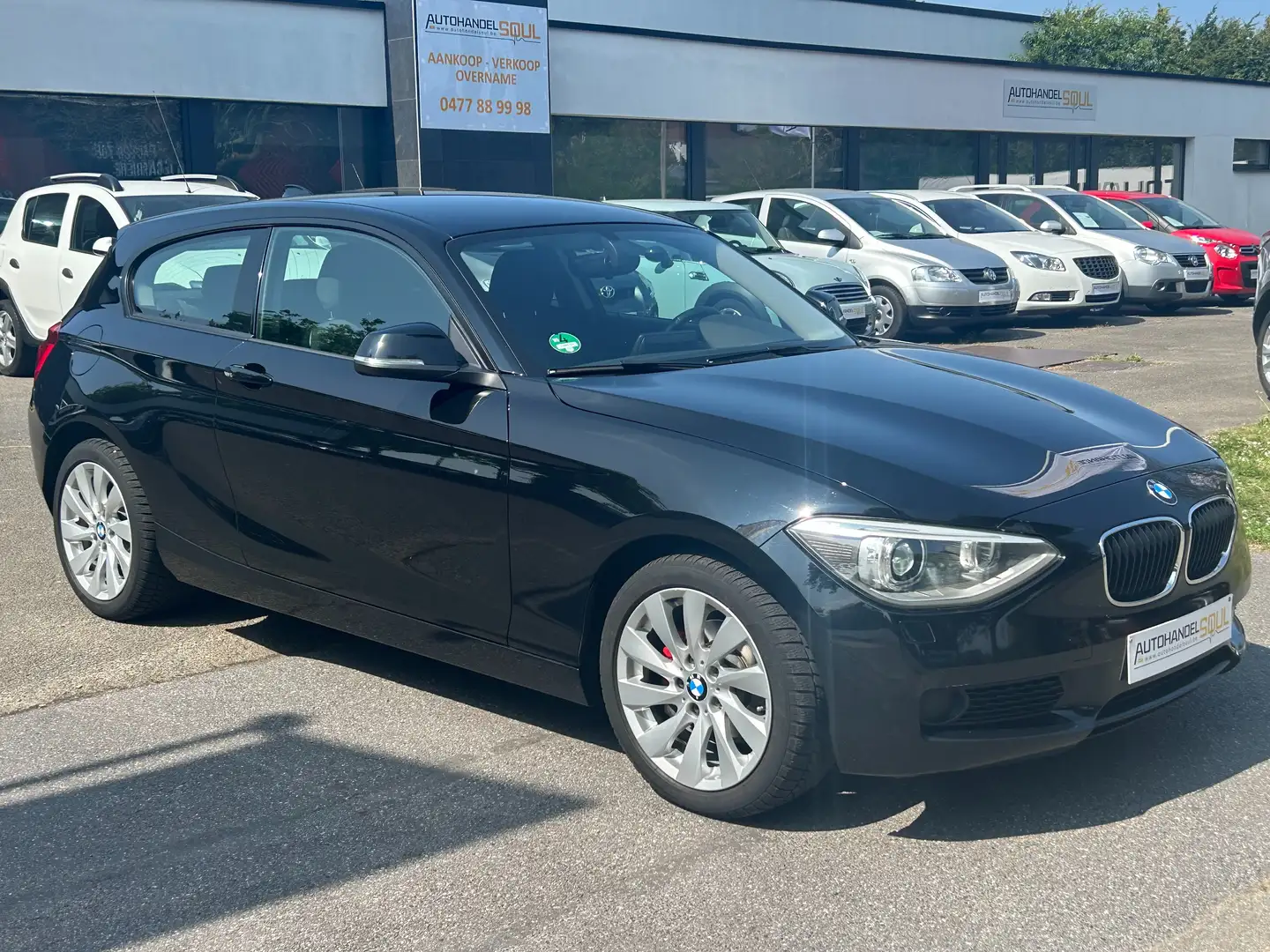 BMW 116 2013, 166.805km, Airco, PDC, Keuring, 12m Garantie Zwart - 2