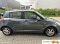 Suzuki Swift 1.3 5drs Airco Velgen ElektrPakket Stoelverwarm Gris - thumbnail 5