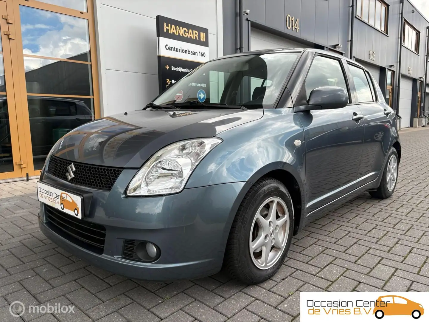 Suzuki Swift 1.3 5drs Airco Velgen ElektrPakket Stoelverwarm Gris - 2