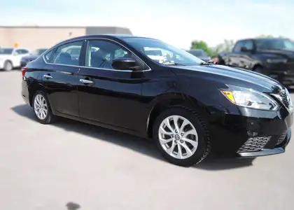 Black 2016 Nissan Sentra SV Sedan Front-Wheel Drive Continuously Variable Transmission