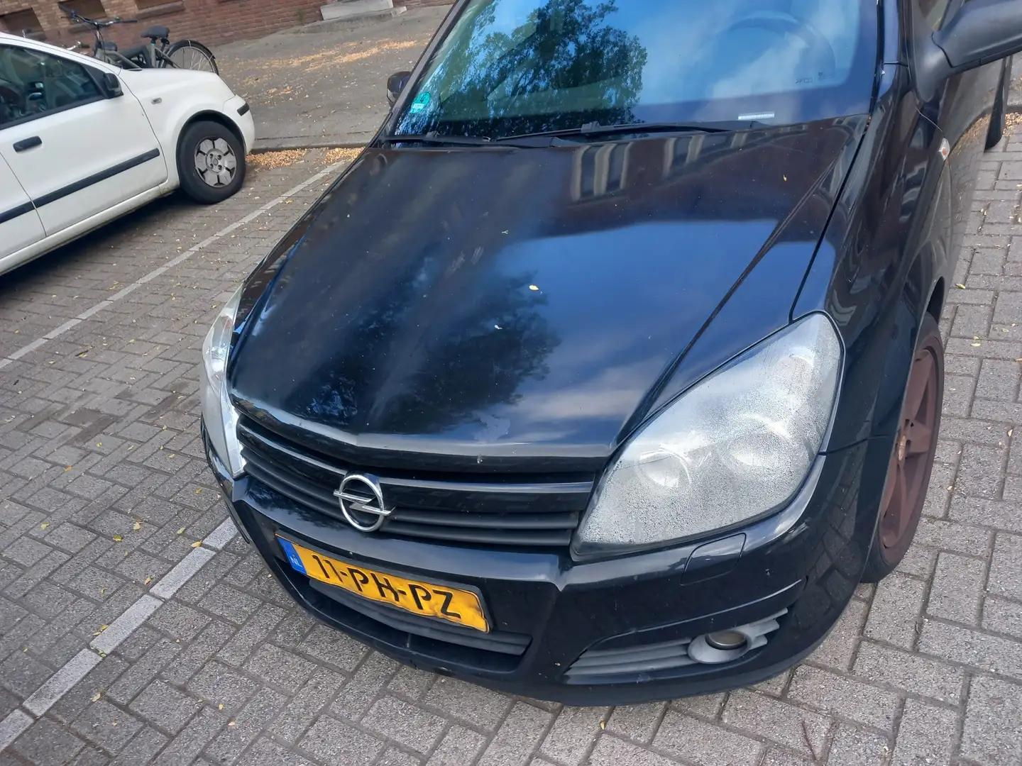 Opel Astra 1.6 Enjoy Zwart - 1