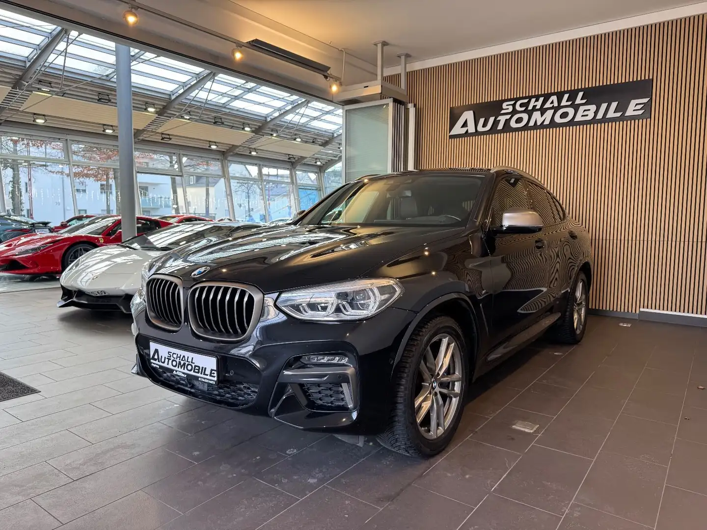 BMW X4 M i AHK/PANO/360CAM/HUD/Driving+/ACC/LED/VOL Schwarz - 1