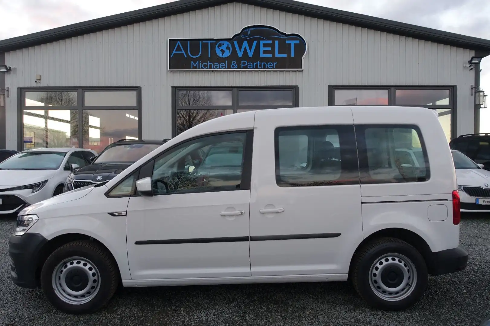 Volkswagen Caddy 1.0 lück.VW-Scheckheft TÜV NEU KLIMAAUT Weiß - 1