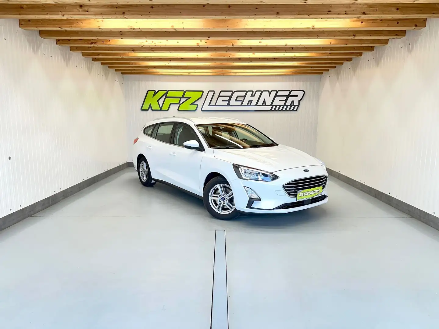 Ford Focus Turnier 1.5 EcoBl. Aut. "AHK*NAVI*LED*PDC" Weiß - 1