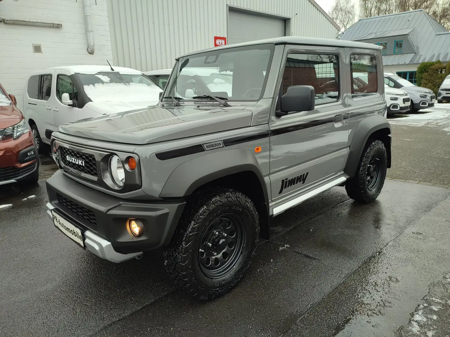 Suzuki Jimny Horizon NFZ Klima/AHK/Navi/Sitzhzg Grau - 1