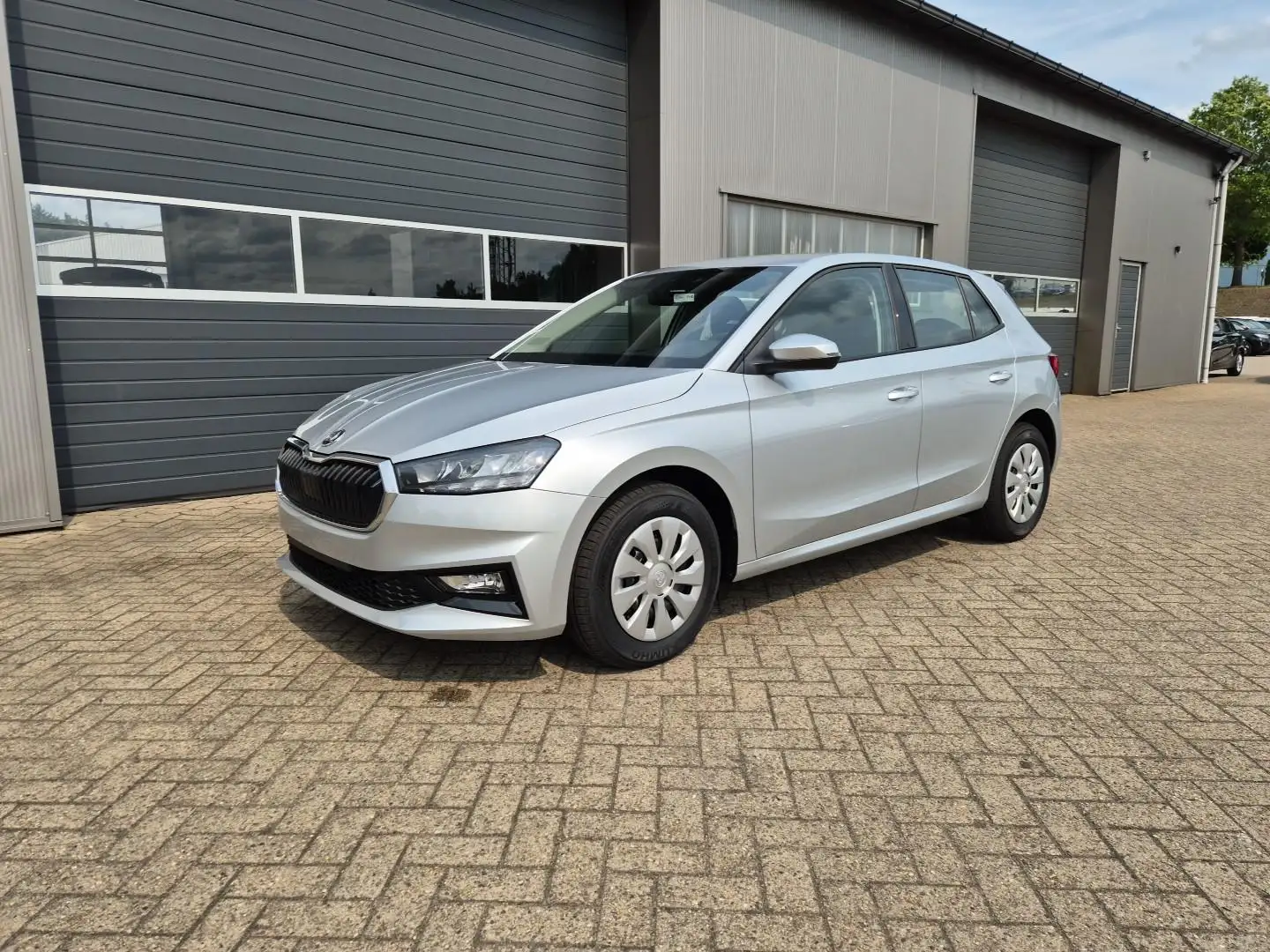 Skoda Fabia 1.0 TSI Selection 5-türig-Klima-Sitzheizung-Parkse Argent - 1