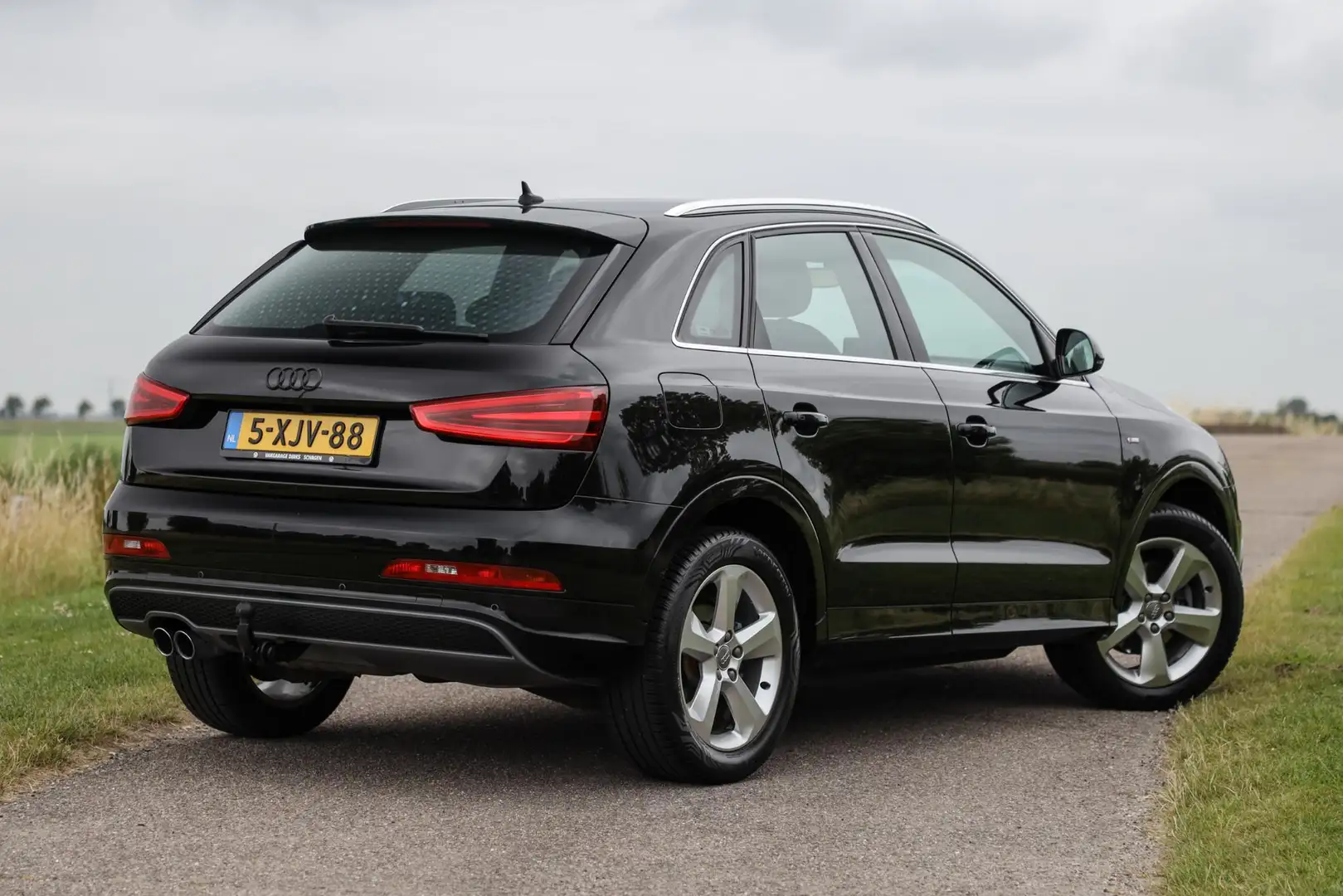 Audi Q3 1.4 TFSI 150 pk Aut. S-Line ✅ Leder ✅ Xenon ✅ Came Zwart - 2