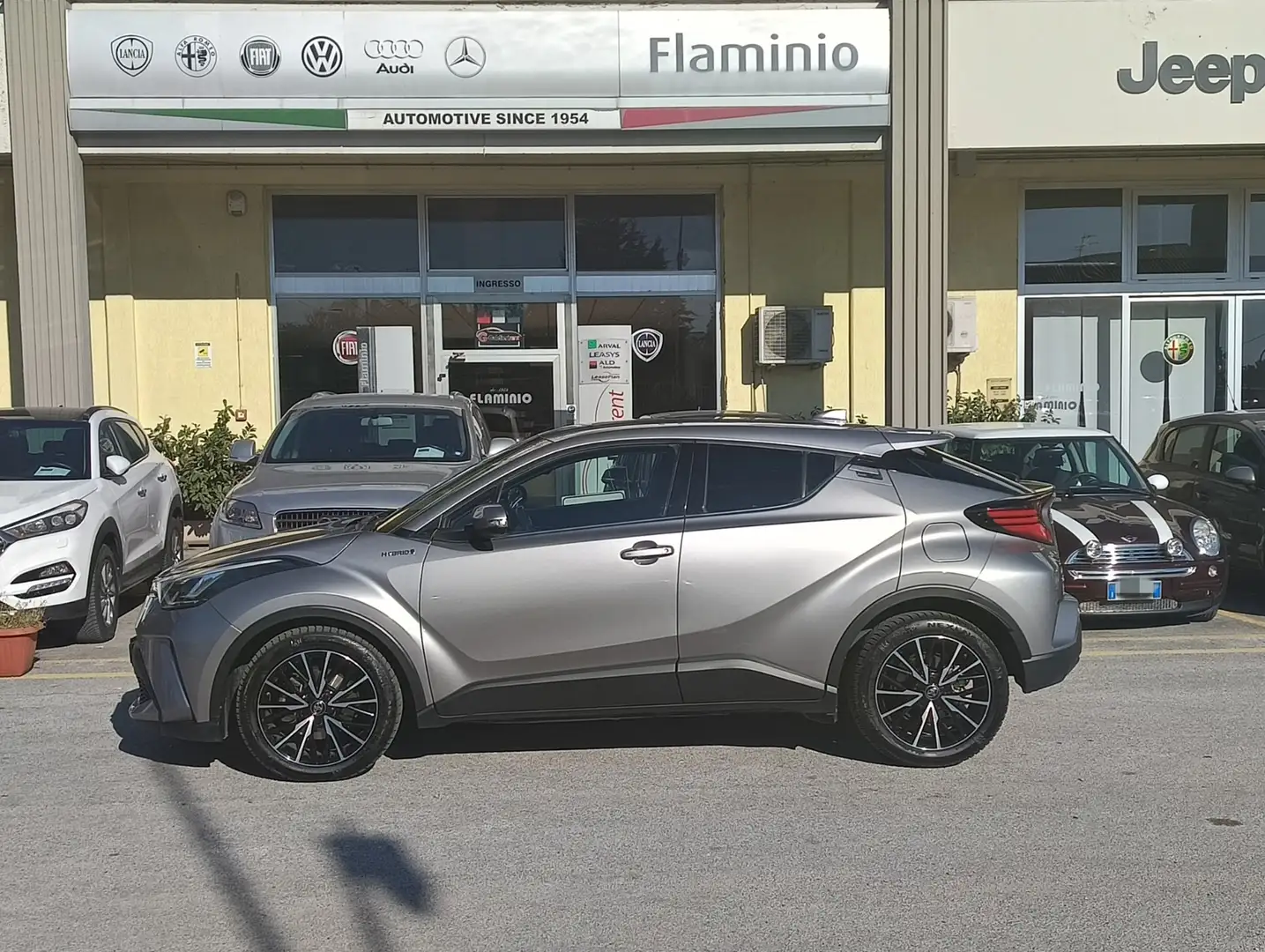 Toyota C-HR 1.8h Lounge e-cvt - 1