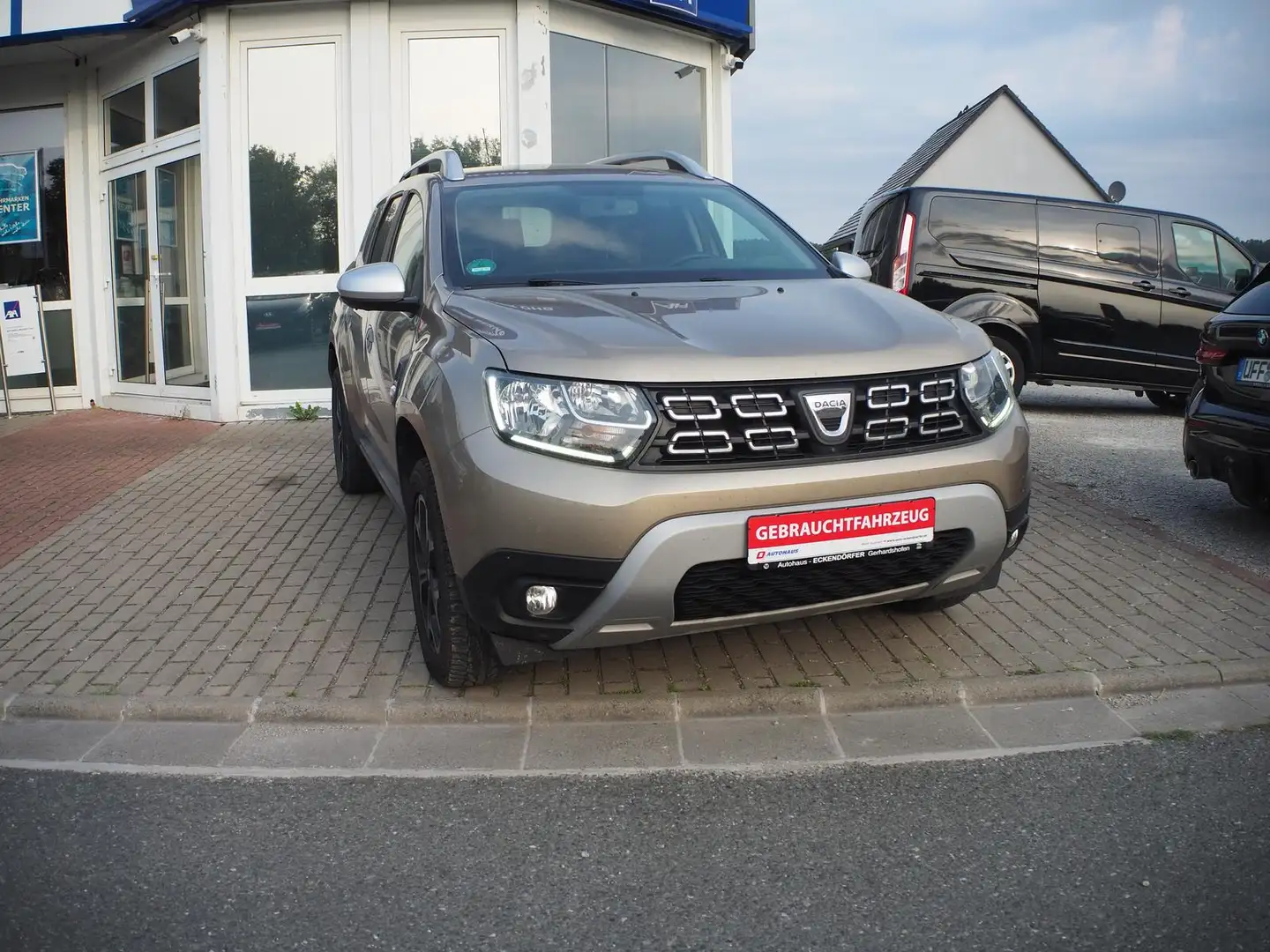 Dacia Duster 1.3 TCE Prestige *Allwetter*Kamera* Beige - 1