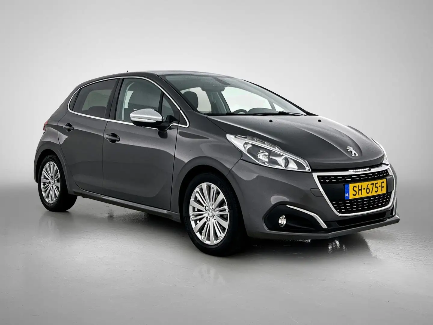 Peugeot 208 1.2 PureTech Allure 110pk | Climate Control | Navi Grijs - 2